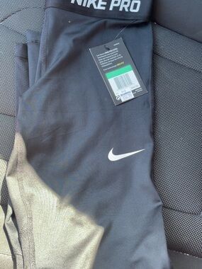 Nike Black Leggings with White Swoosh Tag